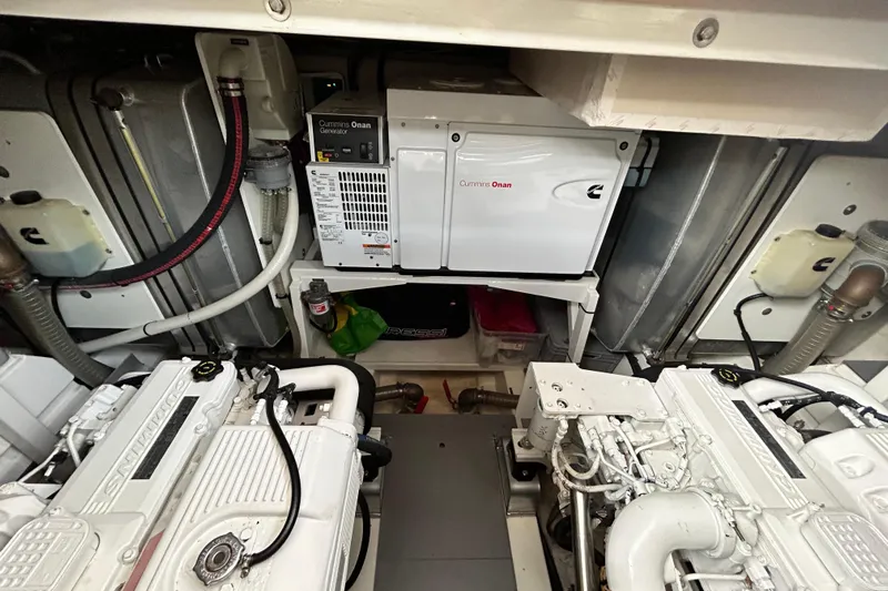  Yacht Photos Pics Engine room of 2014 Prestige 550 Fly yacht with Cummins Onan generator.