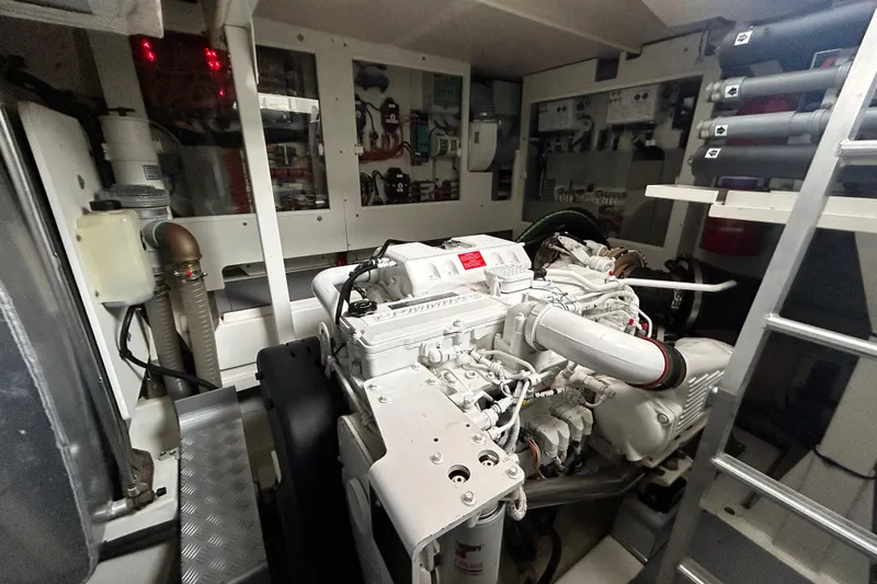  Yacht Photos Pics Engine room of 2014 Prestige 550 Fly yacht, showcasing mechanical components and systems.