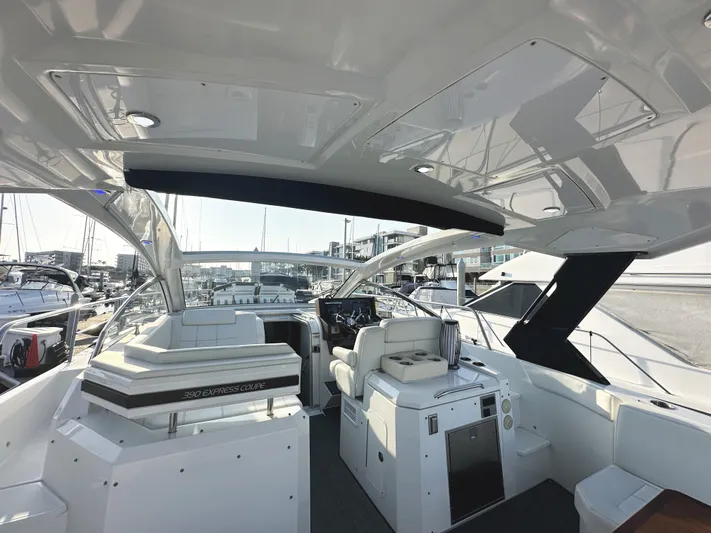 Lux Life Yacht Photos Pics 2017 Cruisers Yachts 390 Express Coupe interior with sleek design and modern amenities.