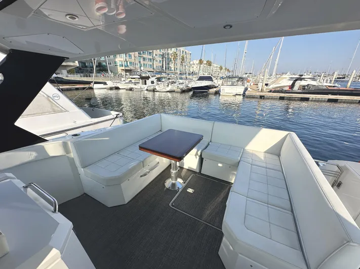 Lux Life Yacht Photos Pics 2017 Cruisers Yachts 390 Express Coupe, spacious deck with marina view.