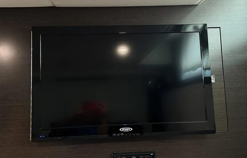 Lux Life Yacht Photos Pics Flat-screen TV inside 2017 Cruisers Yachts 390 Express Coupe.