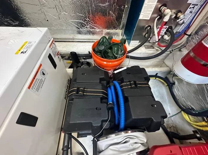 Lux Life Yacht Photos Pics Engine room of 2017 Cruisers Yachts 390 Express Coupe with equipment and wiring.