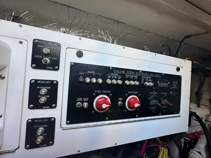 Lux Life Yacht Photos Pics Control panel of 2017 Cruisers Yachts 390 Express Coupe engine room.