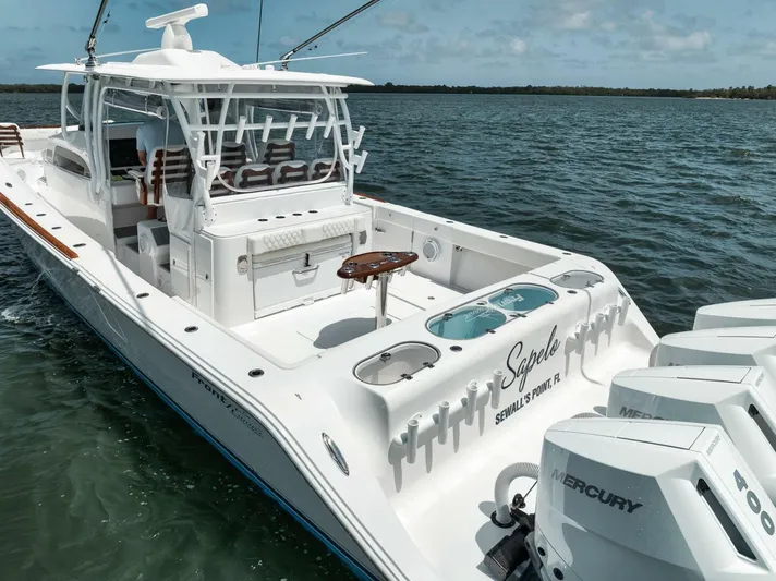 Sapelo Yacht Photos Pics 2024 Front Runner 47 Center Console boat on water, featuring Mercury engines.