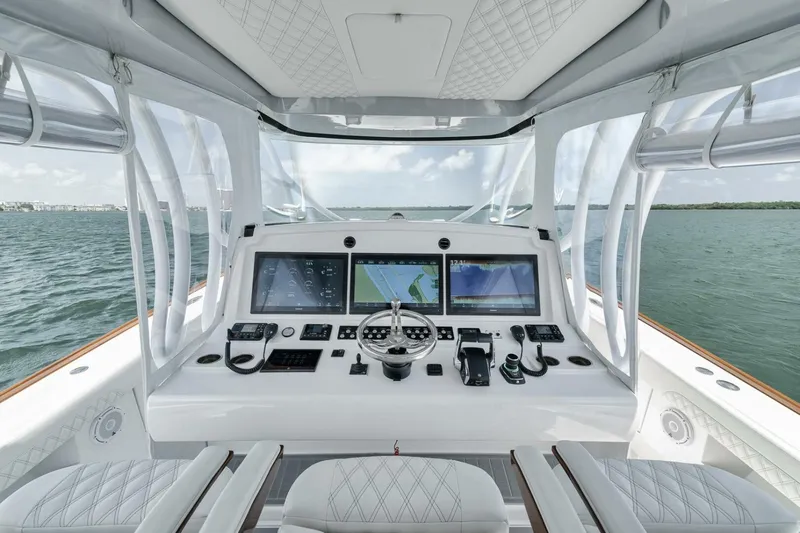 Sapelo Yacht Photos Pics 2024 Front Runner 47 Center Console boat cockpit with advanced navigation systems on open water.
