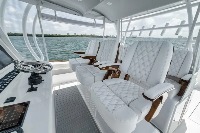 Sapelo Yacht Photos Pics 2024 Front Runner 47 Center Console with luxurious white seating and sleek design.