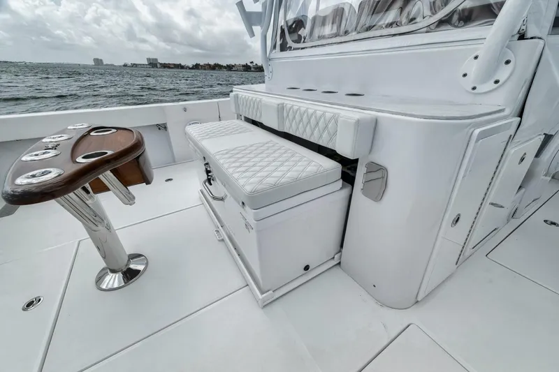 Sapelo Yacht Photos Pics 2024 Front Runner 47 Center Console boat interior with seating and rod holders.