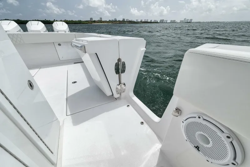 Sapelo Yacht Photos Pics 2024 Front Runner 47 Center Console boat on water, featuring sleek white deck design.