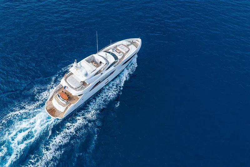 Insignia Yacht Photos Pics Luxurious 2015 Sunseeker 115 yacht cruising on open blue sea.