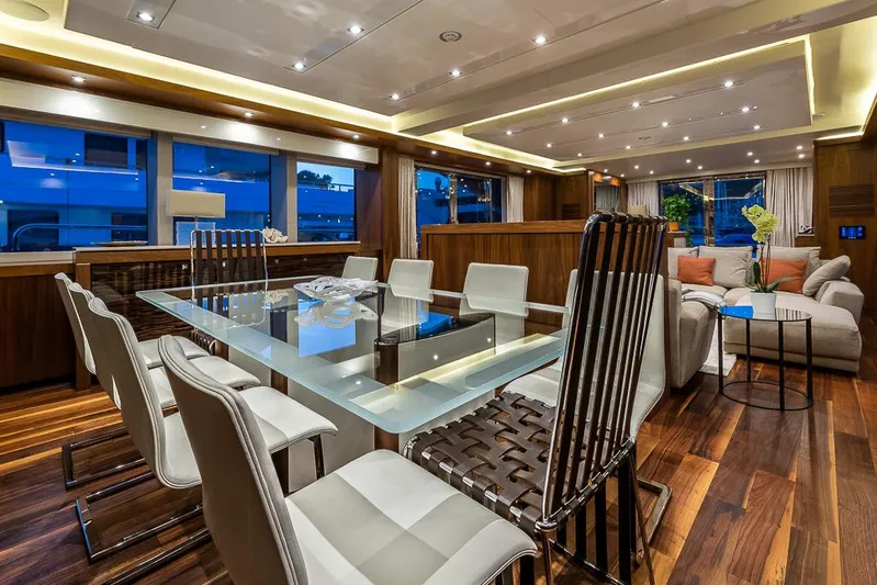 Insignia Yacht Photos Pics Luxurious interior of 2015 Sunseeker 115 yacht with elegant dining and seating area.