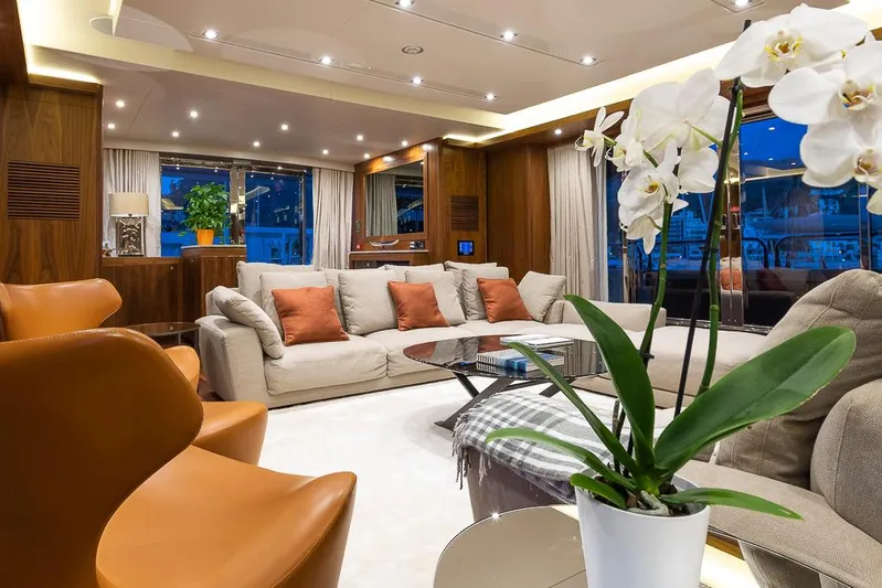 Insignia Yacht Photos Pics Luxurious Sunseeker 115 yacht interior, featuring elegant seating, modern decor, and ambient lighting.