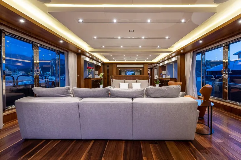 Insignia Yacht Photos Pics Luxurious interior of 2015 Sunseeker 115 yacht with elegant seating and ambient lighting.