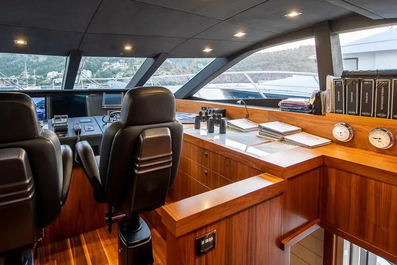 Insignia Yacht Photos Pics Luxurious Sunseeker 115 yacht interior with modern helm and wooden finishes, 2015 model.