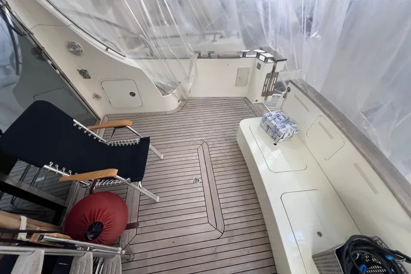  Yacht Photos Pics 2009 Cantieri Estensi Goldstar 42 Fly yacht deck with seating and lounge chair.