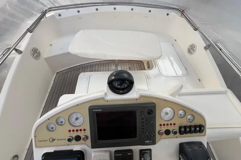  Yacht Photos Pics 2009 Cantieri Estensi Goldstar 42 Fly yacht helm with navigation instruments and controls.