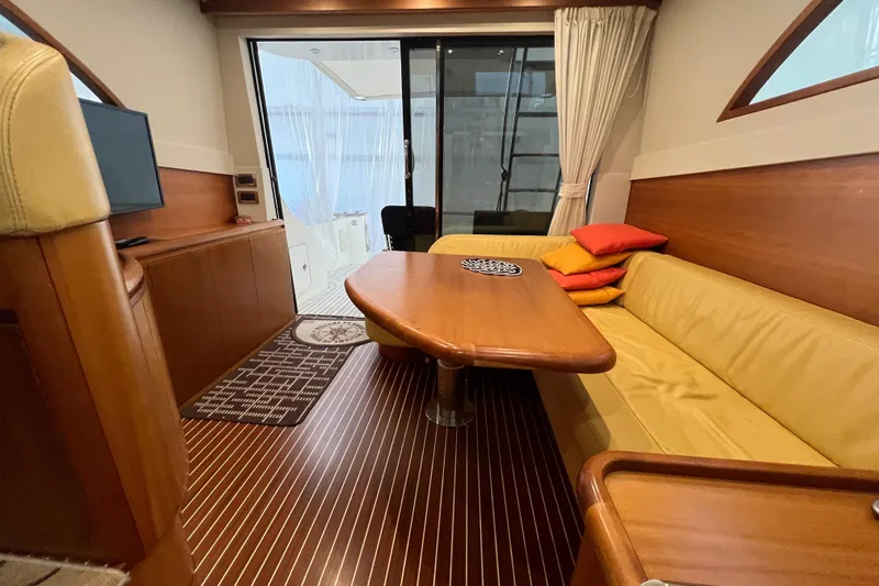  Yacht Photos Pics Luxurious interior of 2009 Cantieri Estensi Goldstar 42 Fly yacht with wooden finishes.