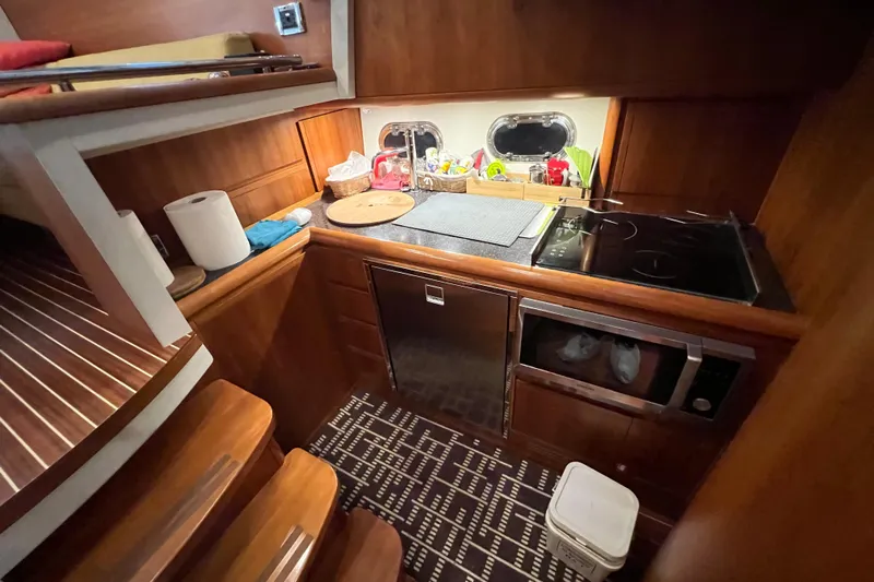  Yacht Photos Pics Kitchen area of 2009 Cantieri Estensi Goldstar 42 Fly yacht with modern amenities.