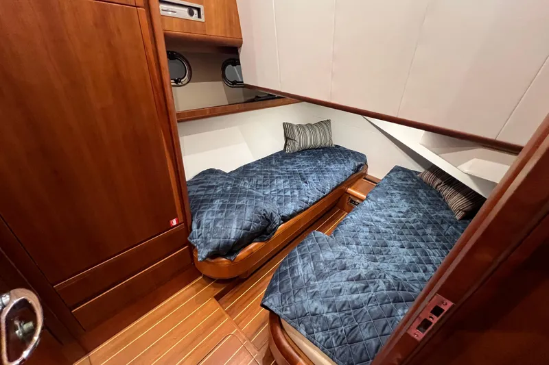  Yacht Photos Pics Luxurious twin cabin interior of 2009 Cantieri Estensi Goldstar 42 Fly yacht.