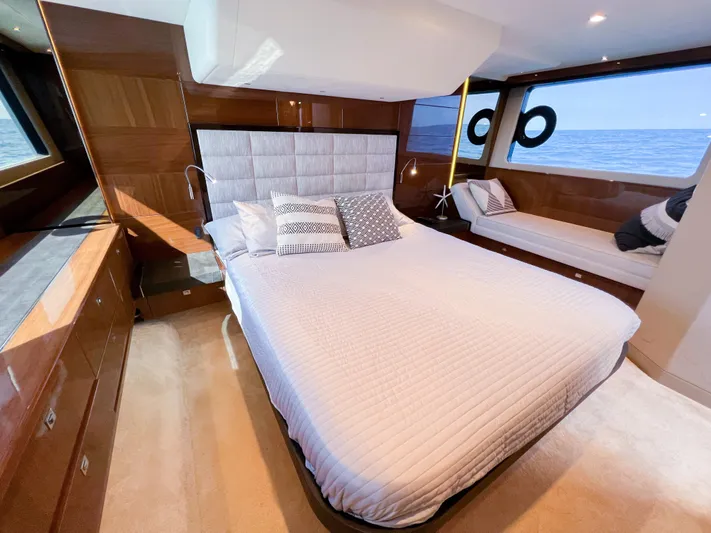  Yacht Photos Pics Luxurious bedroom interior of 2013 Princess 60 yacht with ocean view.