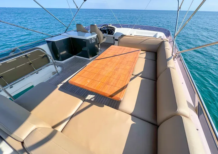  Yacht Photos Pics Luxurious 2013 Princess 60 yacht deck with spacious seating and ocean view.