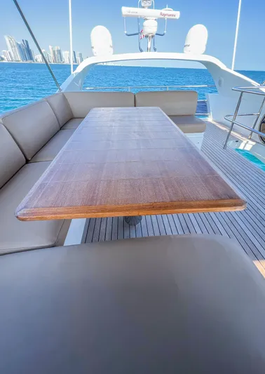  Yacht Photos Pics Luxurious 2013 Princess 60 yacht deck with elegant seating and ocean view.