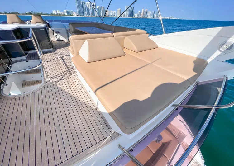  Yacht Photos Pics Luxury Princess 60 yacht deck with sun loungers, ocean view, 2013 model.