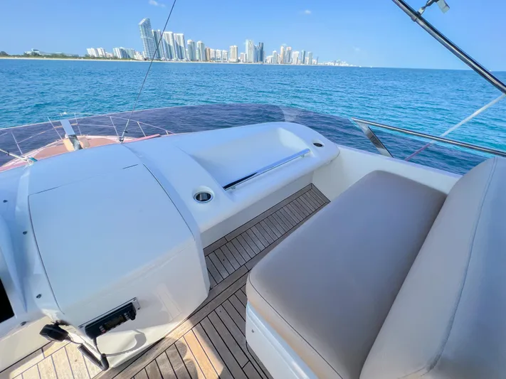  Yacht Photos Pics Luxury Princess 60 yacht deck with city skyline and ocean view, 2013 model.