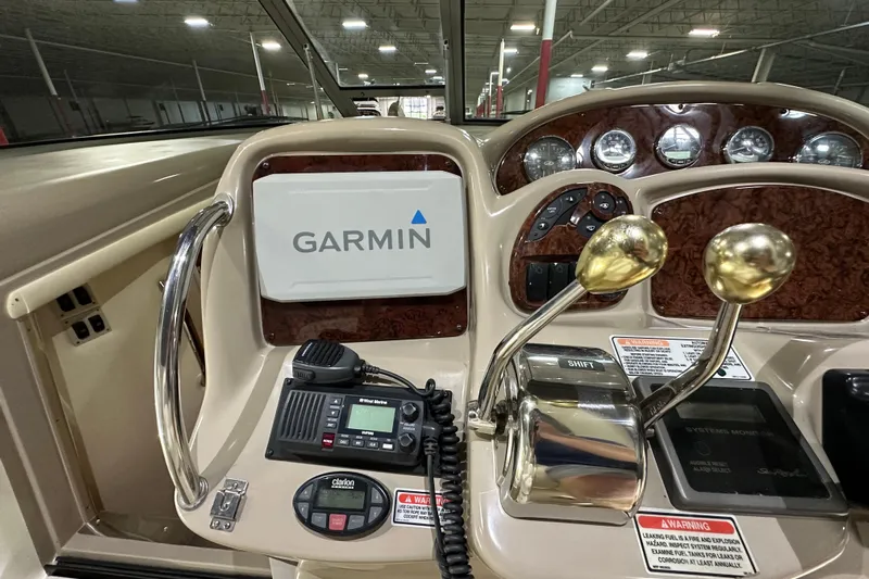  Yacht Photos Pics Control panel of a 2004 Sea Ray 340 Sundancer with Garmin navigation system.
