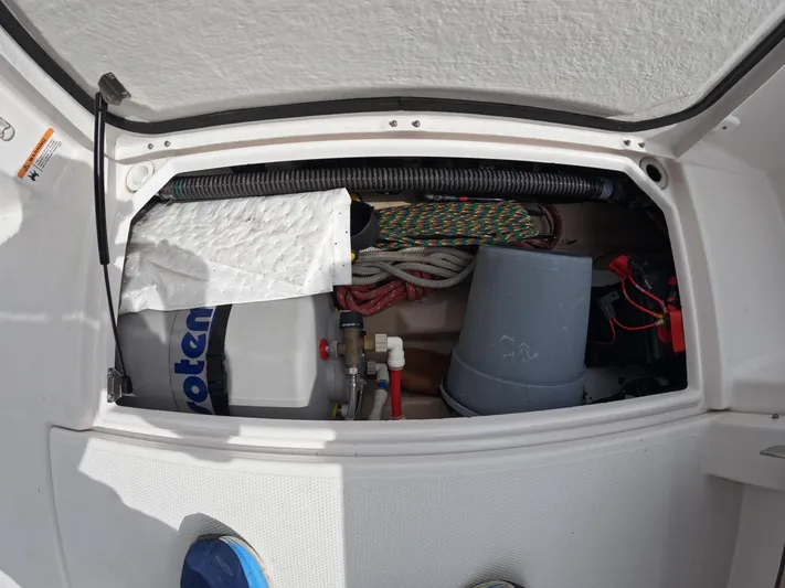  Yacht Photos Pics Storage compartment of 2020 Ranger Tugs R-27 boat with equipment and supplies.