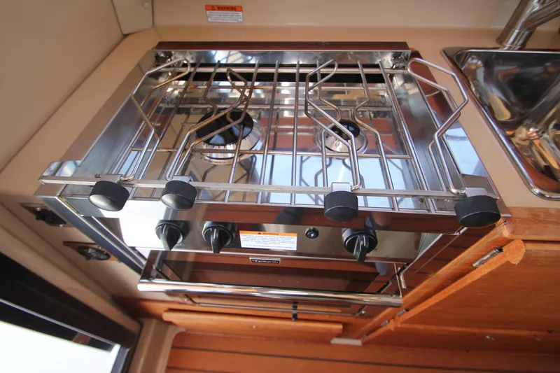  Yacht Photos Pics Stainless steel stove in 2020 Ranger Tugs R-27 boat kitchen.