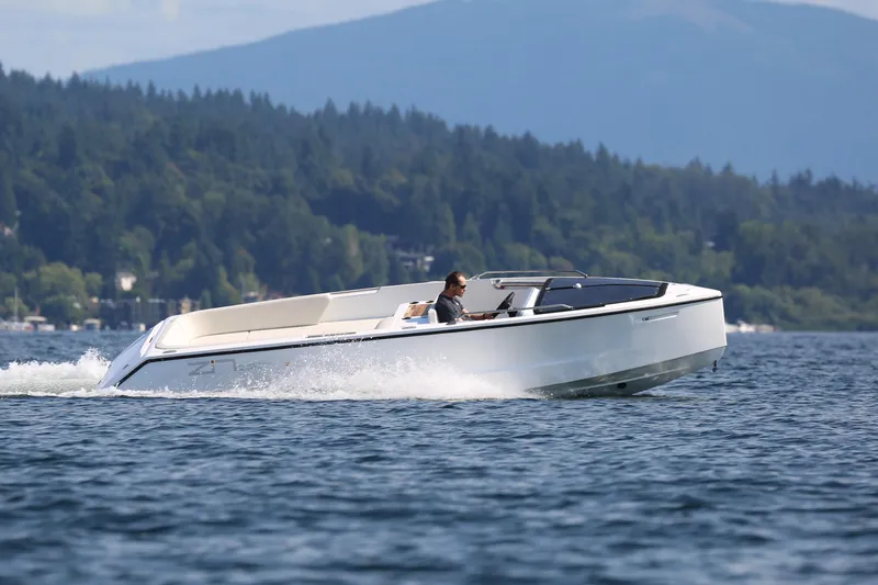  Yacht Photos Pics 2025 Zin Boats Z7 cruising Roof down and platform closed.