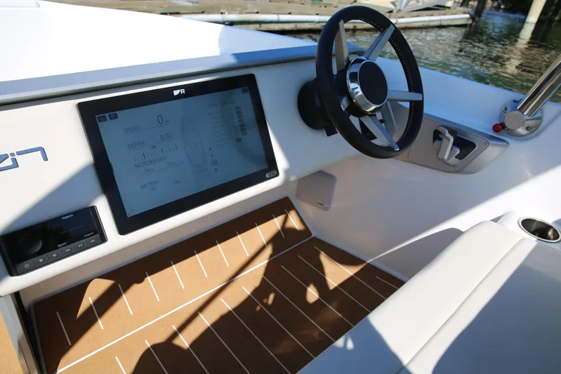  Yacht Photos Pics 2025 Zin Boats Z7 dashboard with Raymarine touchscreen display and custom throttle.