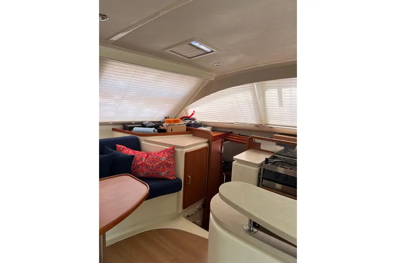  Yacht Photos Pics Interior of 2010 Leopard 40 catamaran with kitchen and seating area.