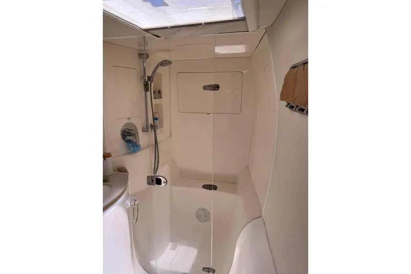  Yacht Photos Pics Bathroom interior of a 2010 Leopard 40 yacht, featuring a shower and sink.