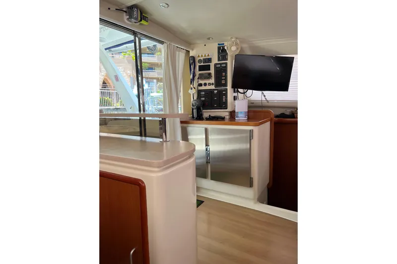  Yacht Photos Pics Interior of 2010 Leopard 40 yacht with control panel and TV.