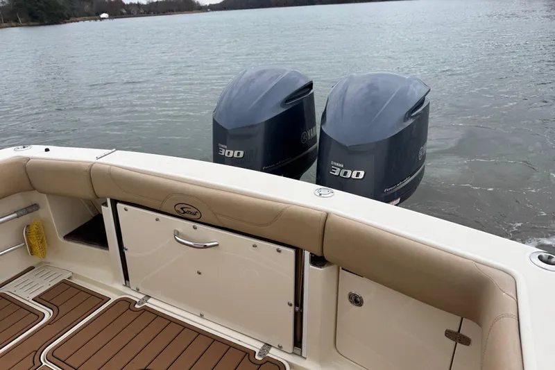  Yacht Photos Pics 2016 Scout 300 LXF boat with twin Yamaha 300 engines on a calm lake.