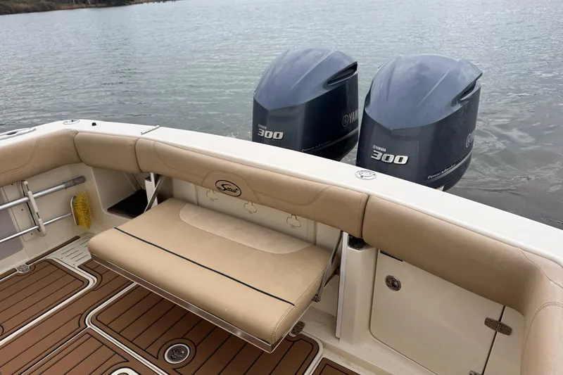  Yacht Photos Pics 2016 Scout 300 LXF boat with twin Yamaha 300 engines on calm water.