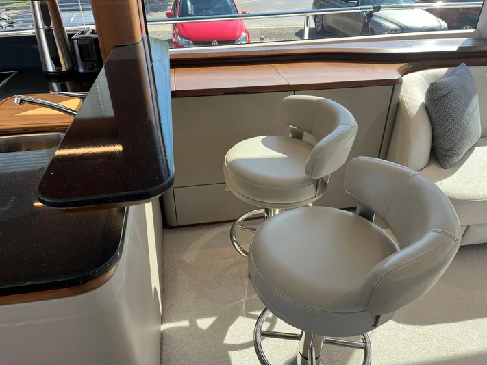  Yacht Photos Pics Interior of 2022 Princess Y72 yacht with modern bar stools.