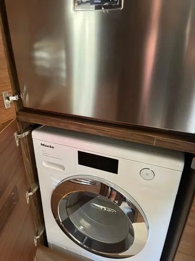  Yacht Photos Pics Miele washing machine in a 2022 Princess Y72 yacht.