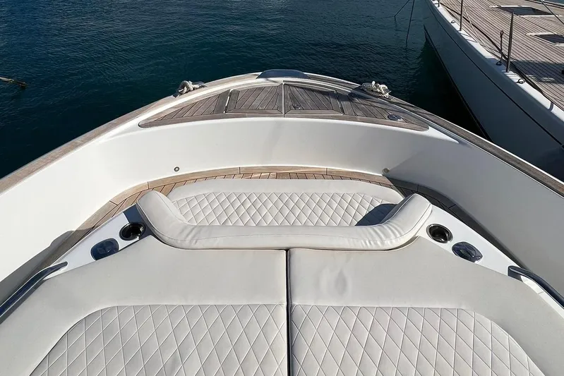  Yacht Photos Pics Luxurious deck of 2022 Solaris Power 44 Open yacht with quilted seating.