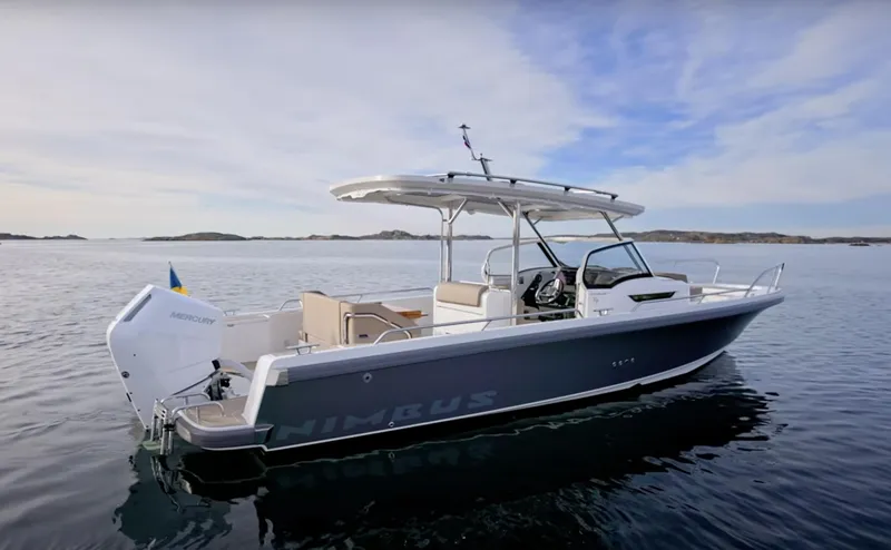 San #155 In Stock Yacht Photos Pics 2024 Nimbus T9 boat on calm water, featuring sleek design and modern amenities.