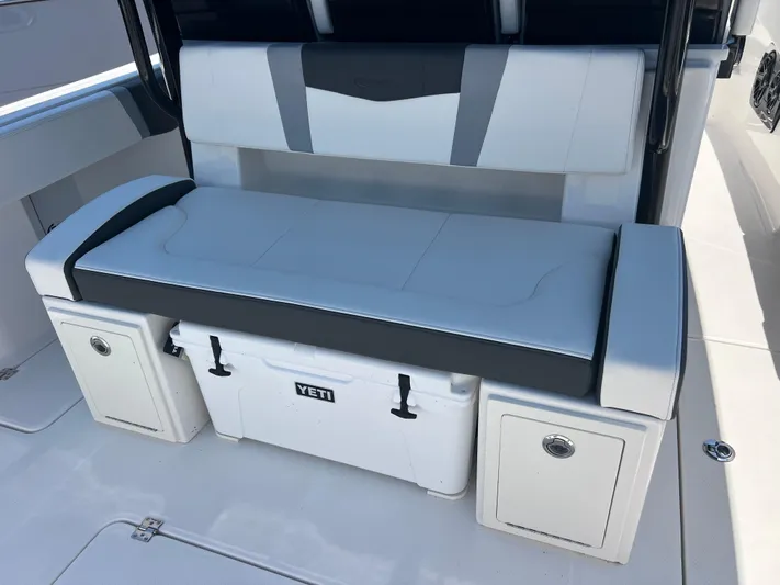  Yacht Photos Pics 2025 Robalo R300 Center Console seating with integrated Yeti cooler.