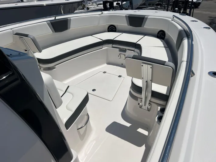 Yacht Photos Pics 2025 Robalo R300 Center Console boat with spacious seating and modern design.