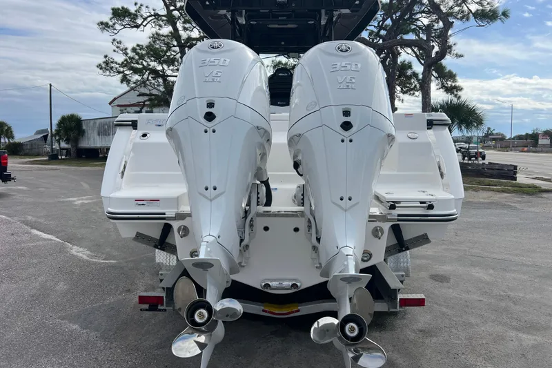  Yacht Photos Pics 2025 Robalo R300 Center Console with twin 350 V6 outboard engines, rear view.