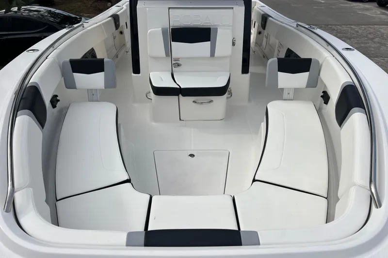  Yacht Photos Pics 2025 Robalo R300 Center Console boat interior with white and black seating.