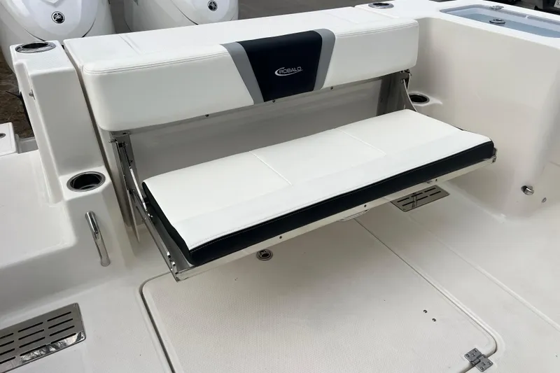  Yacht Photos Pics 2025 Robalo R300 Center Console boat with foldable seating and cup holders.
