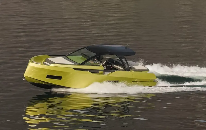  Yacht Photos Pics 2025 Blu Martin Yachts WALK AROUND 46 cruising on water, sleek design, vibrant color.