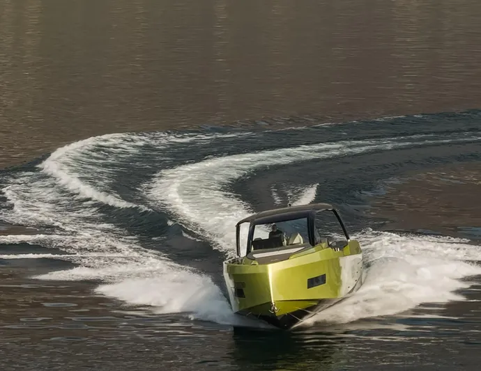  Yacht Photos Pics 2025 Blu Martin Yachts WALK AROUND 46 cruising on water, creating dynamic wake patterns.