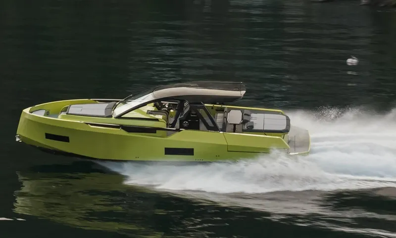  Yacht Photos Pics 2025 Blu Martin Yachts WALK AROUND 46 cruising on water, sleek green design.