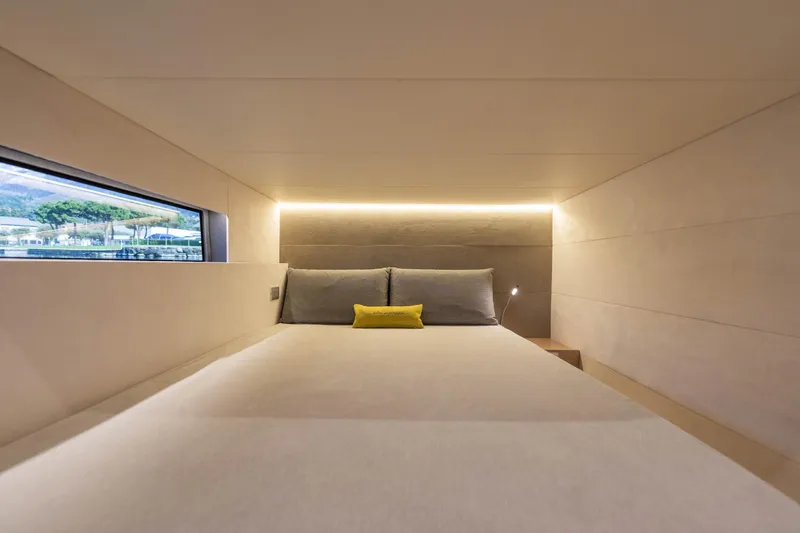  Yacht Photos Pics Luxurious cabin interior of 2025 Blu Martin Yachts WALK AROUND 46 with modern lighting.